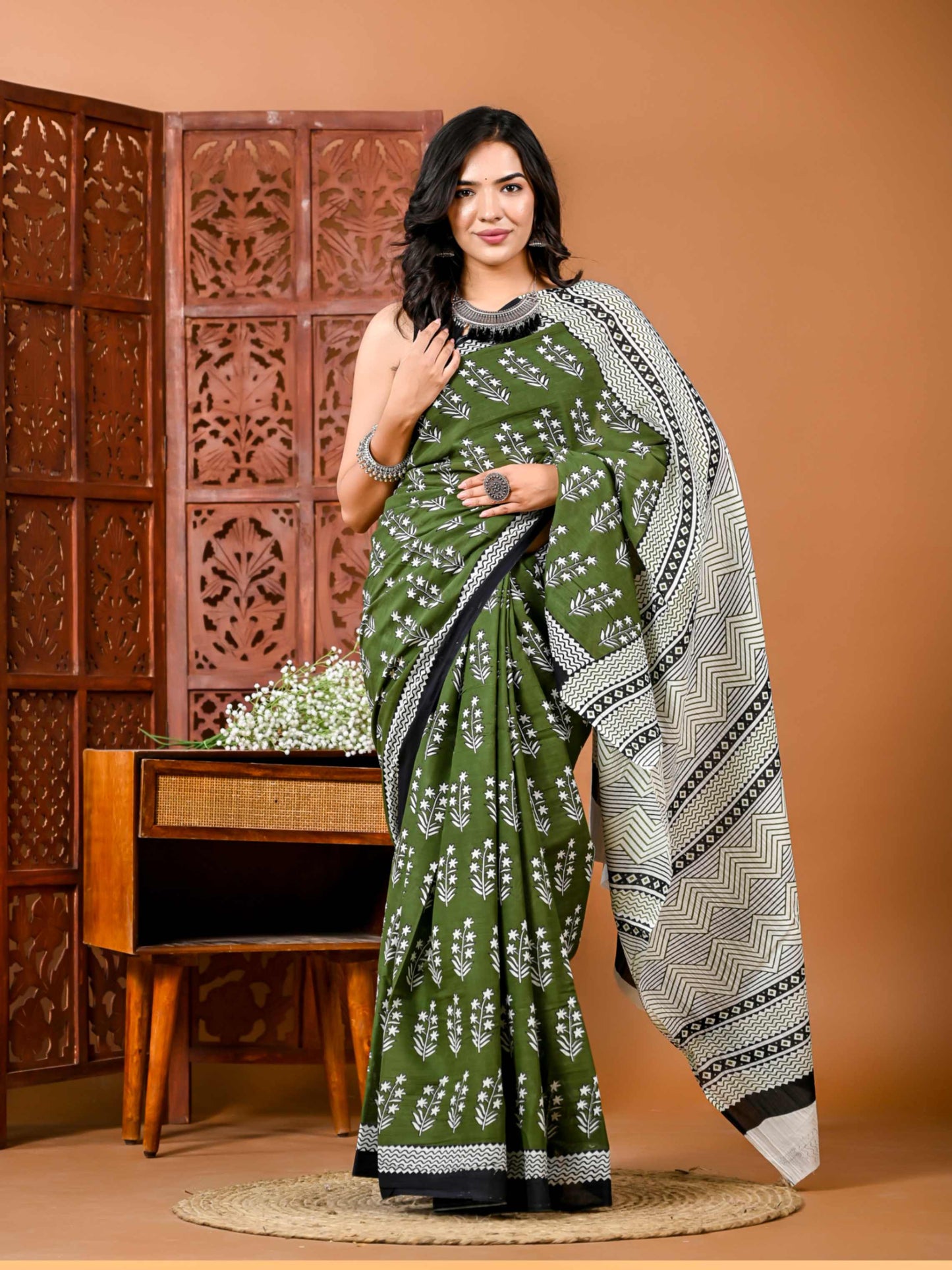 Floral printed green Cotton Saree with Motifs and Matching Blouse