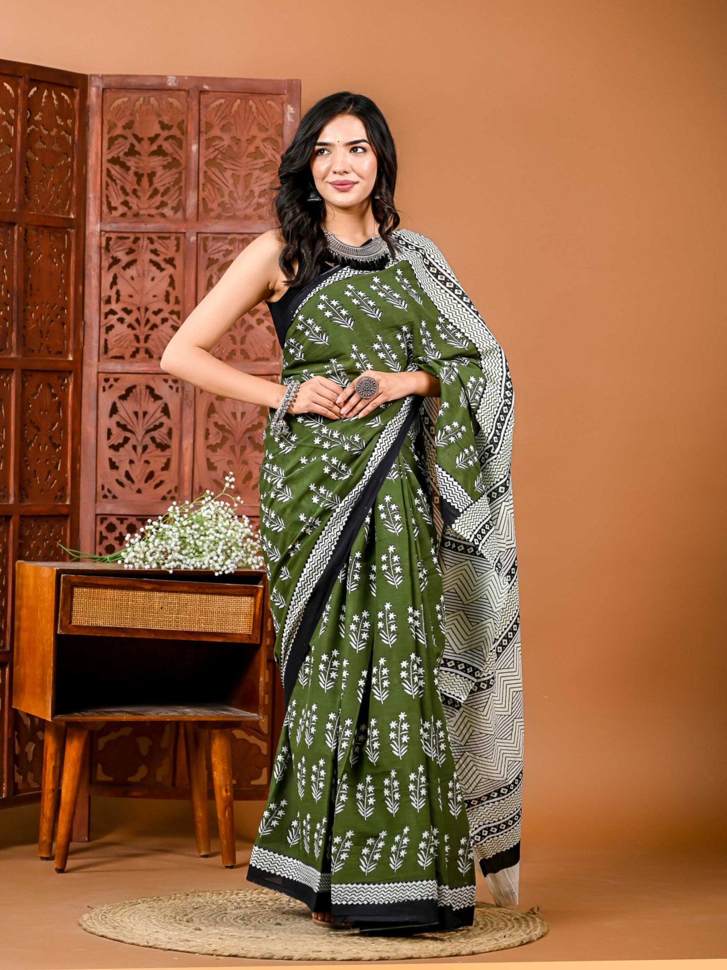 Floral printed green Cotton Saree with Motifs and Matching Blouse